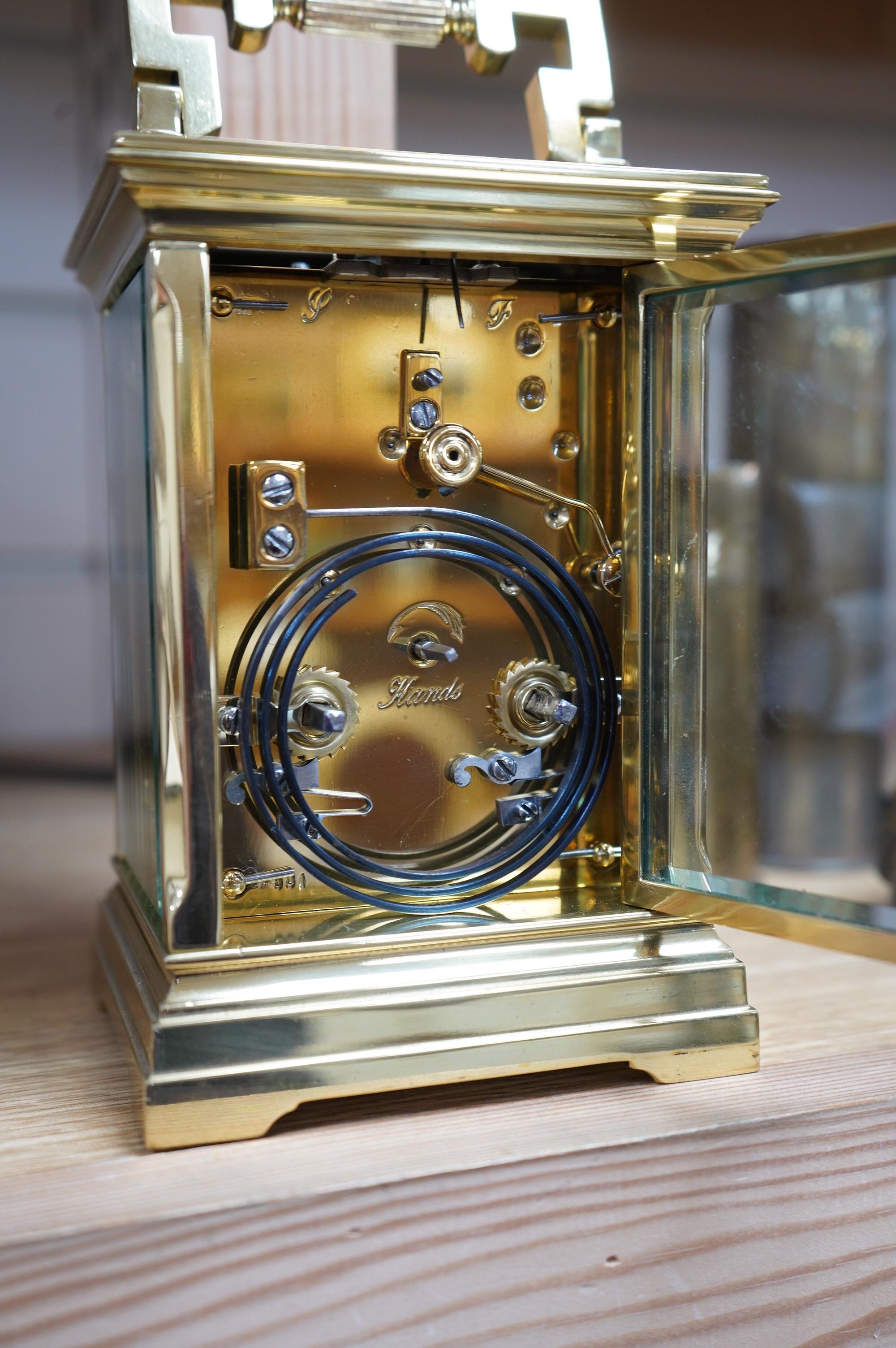 A brass cased carriage clock, the dial inscribed Shepheard & Company, no key, 18cm high. Condition - good, untested